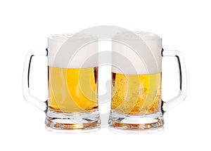 Two beer mugs on a white background