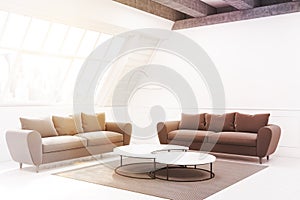 Two beige sofas and a table, side view