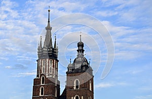 The two bell towers of Saint Mary`s Church on main market square in Krakow, Poland