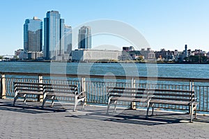 Two Benches along the East River looking out towards Brooklyn in New York City