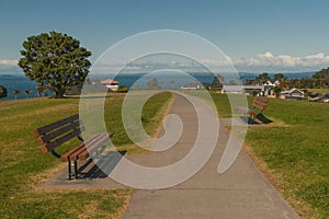 Two benches facing each other with view of the ocean