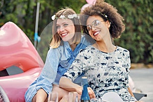 Two Best Friends Sharing Laughter at Bridesmaid\'s Bachelorette Celebration