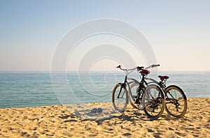 Two bicycles on the beach
