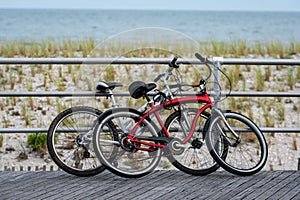 Two bicycles parked on Atlantic city  beach boardwalk