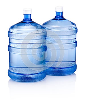 Two big blue plastic cooler bottle for potable water isolated on white background photo