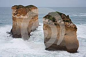 Two big cliffs and the sea at the Great Ocean Road in Australia