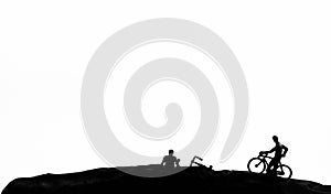 Two biker on hill