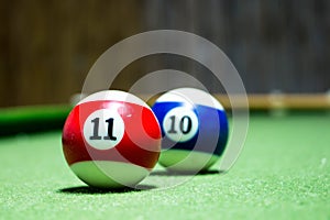 Two billiard balls. Red and Blue