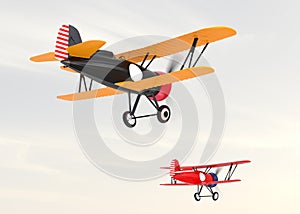 Two biplanes flying in the sky.