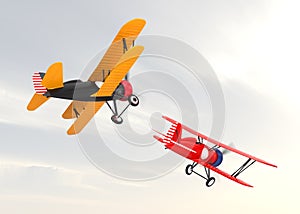 Two biplanes flying in the sky.