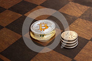 Two Bitcoins and American cents on a chessboard