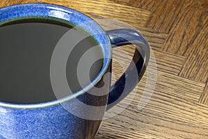 Two Black Coffees in Blue Mugs