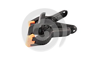 Two black construction clips clothespins