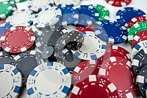 Two black dice on poker chips, top view. Casino concept
