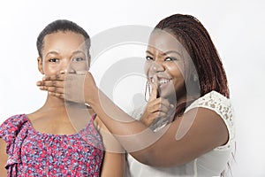 Two Black friends Speak no evil hand