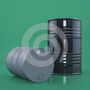 Two black and gray metal barrels on green color background. Front view