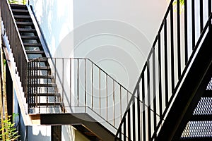 Two black iron stairs decorate abstract pattern