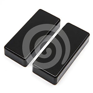 Two black rectangular blocks positioned side by side isolated