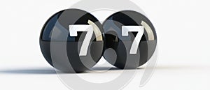 TWO BLACK SPHERES WITH THE NUMBER 7