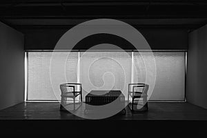 Two Black and White Dramatic Chairs Seating Meeting Decision Important Together Small Table Spotlight Empty Nobody