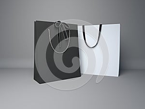 two black and white paper bags, no product name