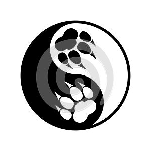 Two black and white paw prints with claws and yin yang symbol. Vector logo. Black and white illustration.