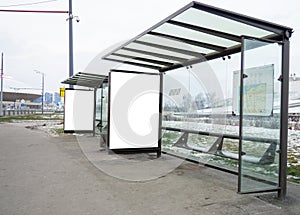 Two blank advertising billboards. Advertising space on a busy street. White empty space to fill