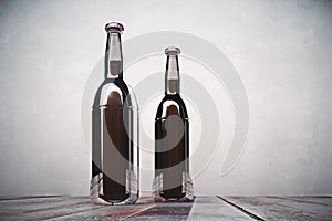 Two blank bottles on light background