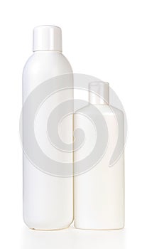 Two blank bottles of shampoo