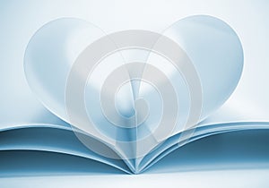 Two blank magazine pages that becomes one heart shape. Clean front view photo of magazine on white background, as concept for