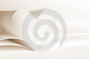 Two blank magazine pages that becomes one heart shape. Clean photo of magazine on white background, as concept for valentines day