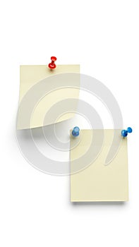 Two blank notes attached to a surface isolated on white background