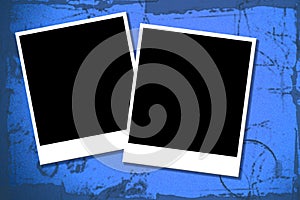 Two blank polaroids