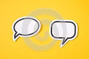 Two Blank Speech Bubble isolated on yellow background