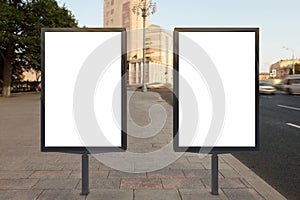 Two blank vertical street billboards