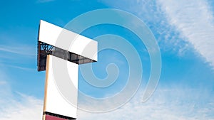 Two blank white billboards and white clouds against blue sky - mock up image