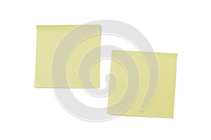 Two blank yellow Post-it notes