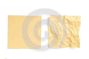 Two blank yellow sticky reminder notes