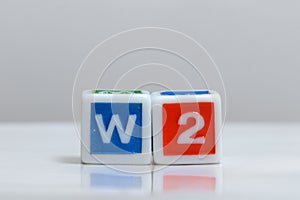 Two blocks with W2 form letters photo