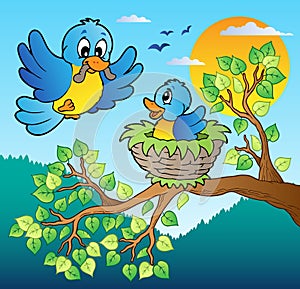 Two blue birds with tree branch