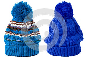 Two blue winter knit ski hat isolated white