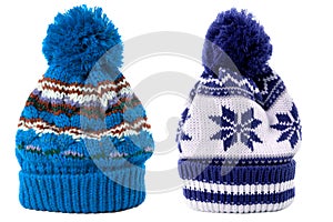 Two blue winter knit ski hat isolated white