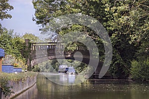 Two Boats Moored Near and Old Bridge near London