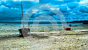 Two boats waiting for the high tide.