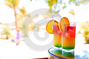 Two bocals of colorful cocktail