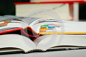 Two books opened and stacked