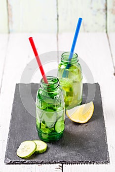 Two botle of infused detox diet refreshing waters: with cucumber and lemon