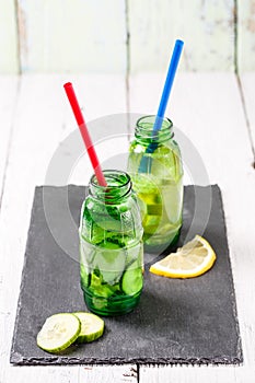 Two botle of infused detox diet refreshing waters: with cucumber and lemon