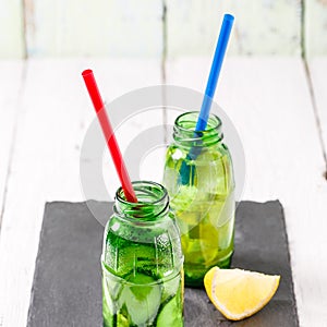 Two botle of infused detox diet refreshing waters: with cucumber and lemon