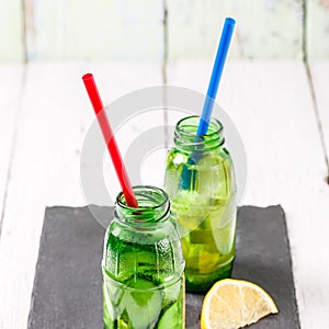 Two botle of infused detox diet refreshing waters: with cucumber and lemon